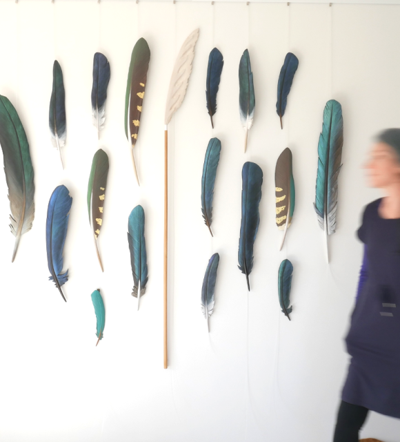 Claire Jensen blur with carved feathers
